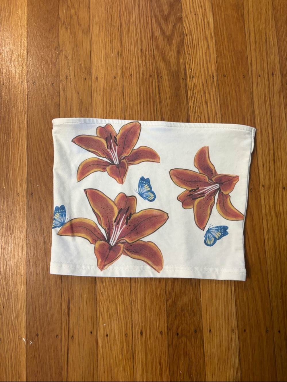 Edikted White Crop Top with Orange Floral & Blue Butterfly Print